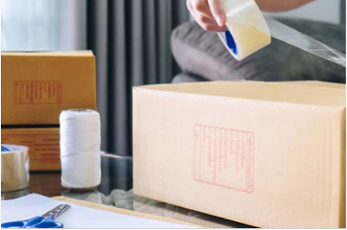 taping up packing boxes